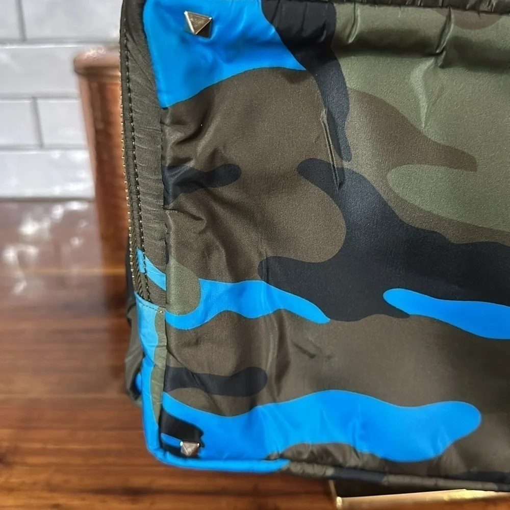 Valentino Garavani with COA nwot. Has hang tag and luggage tag. Unisex. Bookbag